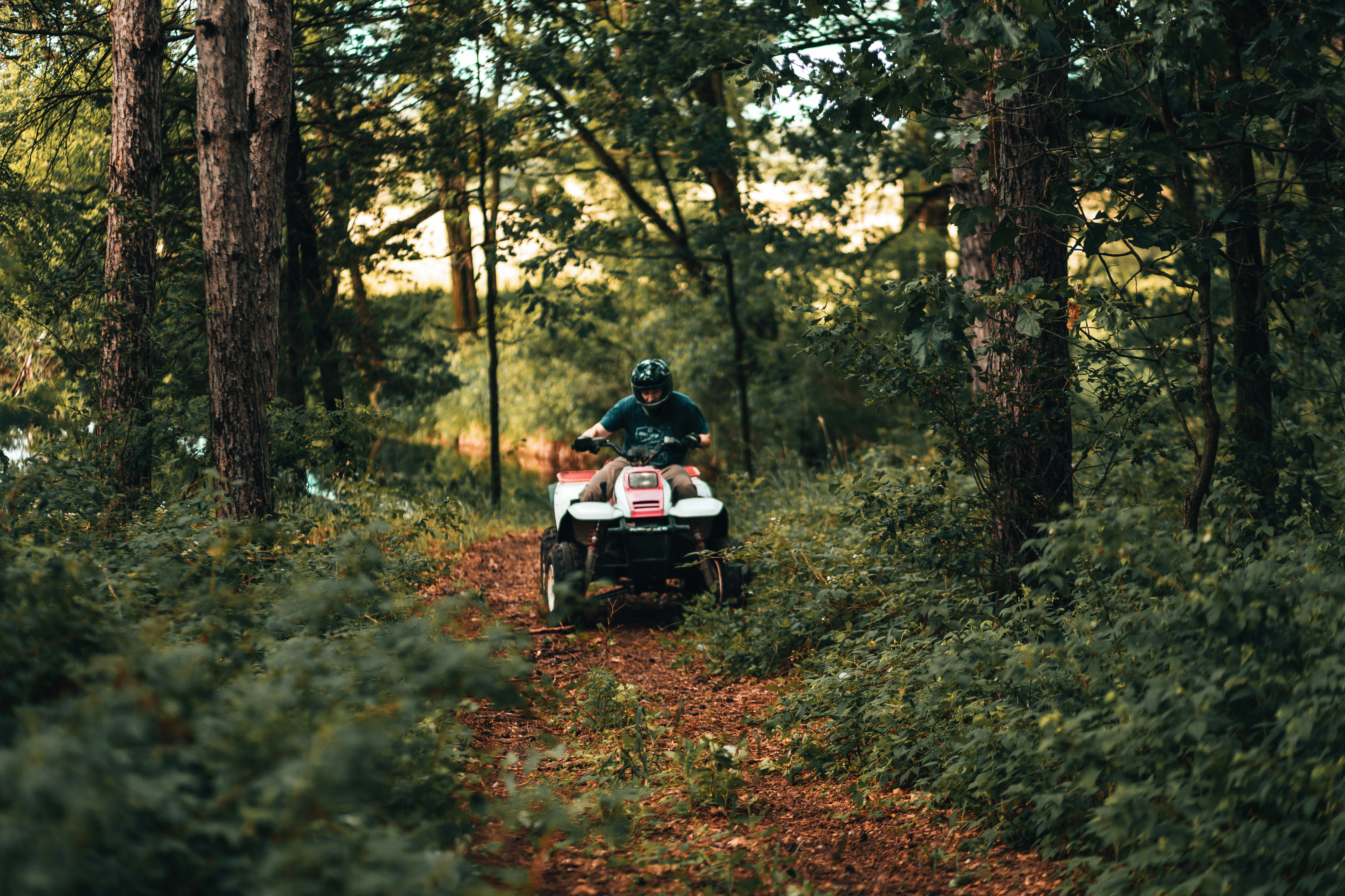 Woman enjoying the ATV ride in the mud